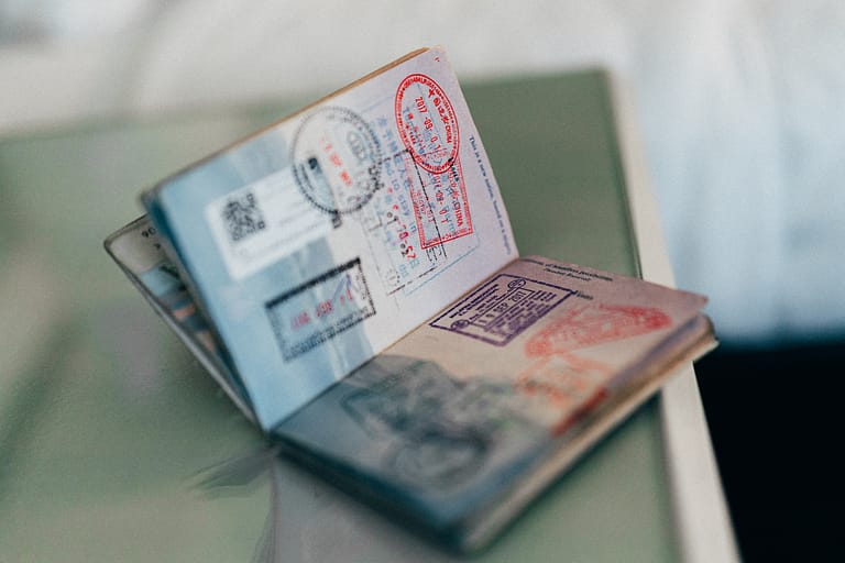 a passport showing visa stamped